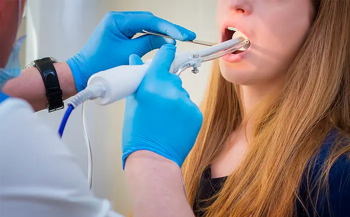 Промывание лакун миндалин